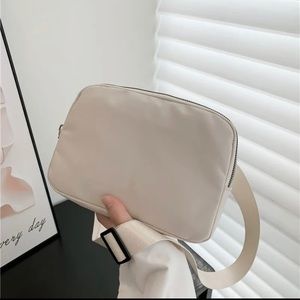 Crème colored belt bag